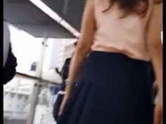I Lifted Her Skirt to Get a Better Upskirt Shot on My Camera Then SHE NOTICE! I notice this sexy Amoi cat-walking through the crowded train station in her black pleated skirt, so i followed her.. I could see her frilly skirt bouncing all over the place as