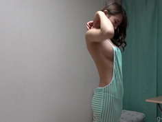 Naked slender girl wears revealing clothes